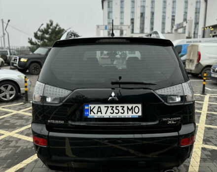 Черный Мицубиси Аутлендер, объемом двигателя 2.36 л и пробегом 120 тыс. км за 10100 $, фото 3 на Automoto.ua