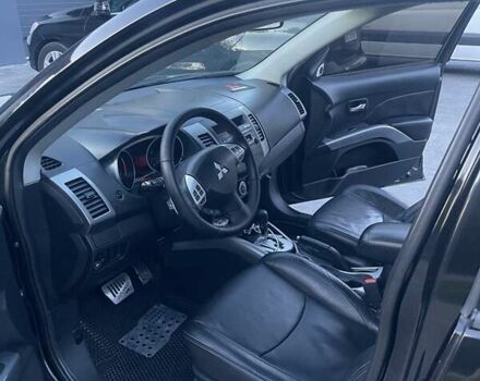 Черный Мицубиси Аутлендер, объемом двигателя 2.4 л и пробегом 290 тыс. км за 9500 $, фото 20 на Automoto.ua