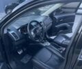 Черный Мицубиси Аутлендер, объемом двигателя 2.4 л и пробегом 290 тыс. км за 9500 $, фото 20 на Automoto.ua