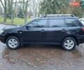 Чорний Міцубісі Аутлендер, об'ємом двигуна 2 л та пробігом 191 тис. км за 7100 $, фото 6 на Automoto.ua
