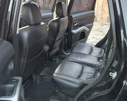 Чорний Міцубісі Аутлендер, об'ємом двигуна 2.4 л та пробігом 230 тис. км за 9700 $, фото 11 на Automoto.ua