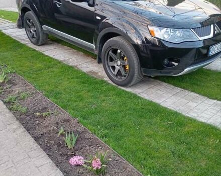 Черный Мицубиси Аутлендер, объемом двигателя 2.35 л и пробегом 245 тыс. км за 8000 $, фото 27 на Automoto.ua