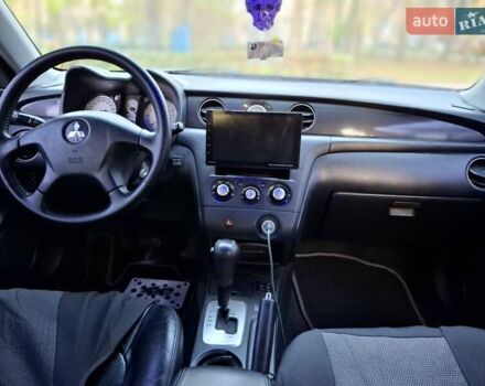 Чорний Міцубісі Аутлендер, об'ємом двигуна 2.38 л та пробігом 245 тис. км за 6800 $, фото 3 на Automoto.ua