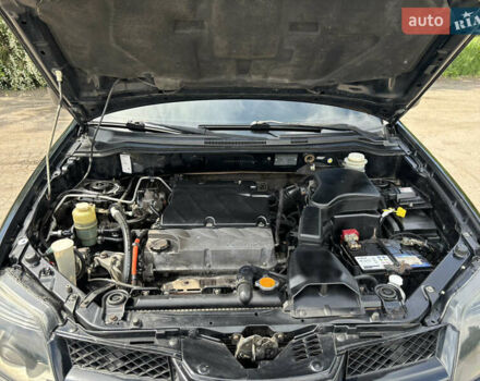 Мицубиси Аутлендер 2008 в Днепре (Днепропетровске) на Automoto.ua Черный Мицубиси Аутлендер, объемом двигателя 2.38 л и пробегом 320 тыс. км за 7500 $, фото 8 на Automoto.ua