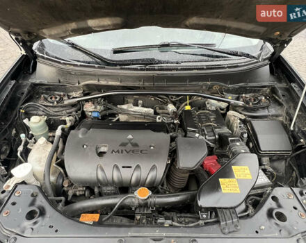 Міцубісі Аутлендер 2008 у Кременчуге на Automoto.ua Чорний Міцубісі Аутлендер, об'ємом двигуна 2.4 л та пробігом 230 тис. км за 6650 $, фото 63 на Automoto.ua