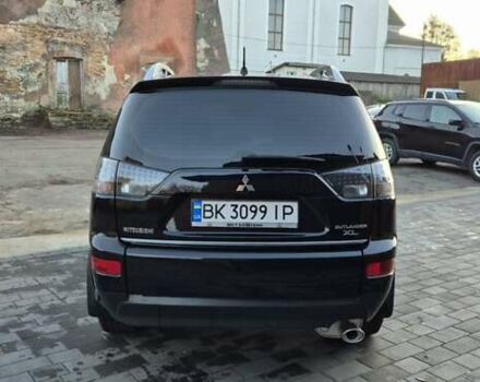Чорний Міцубісі Аутлендер, об'ємом двигуна 2.4 л та пробігом 230 тис. км за 9700 $, фото 5 на Automoto.ua