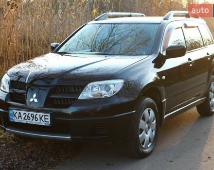 Черный Мицубиси Аутлендер, объемом двигателя 2 л и пробегом 190 тыс. км за 6900 $, фото 31 на Automoto.ua