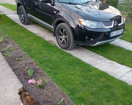 Черный Мицубиси Аутлендер, объемом двигателя 2.35 л и пробегом 245 тыс. км за 8000 $, фото 28 на Automoto.ua