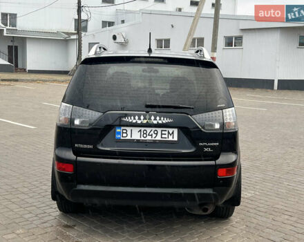 Міцубісі Аутлендер 2008 у Кременчуге на Automoto.ua Чорний Міцубісі Аутлендер, об'ємом двигуна 2.4 л та пробігом 230 тис. км за 6650 $, фото 22 на Automoto.ua