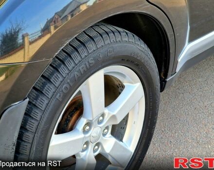 Черный Мицубиси Аутлендер, объемом двигателя 2.4 л и пробегом 189 тыс. км за 7000 $, фото 9 на Automoto.ua