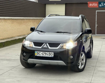 Чорний Міцубісі Аутлендер, об'ємом двигуна 2.4 л та пробігом 221 тис. км за 8700 $, фото 1 на Automoto.ua