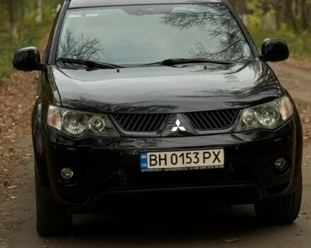 Чорний Міцубісі Аутлендер, об'ємом двигуна 3 л та пробігом 212 тис. км за 10000 $, фото 1 на Automoto.ua