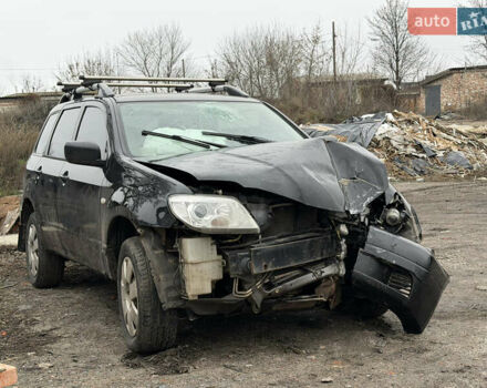 Черный Мицубиси Аутлендер, объемом двигателя 2 л и пробегом 200 тыс. км за 2999 $, фото 6 на Automoto.ua