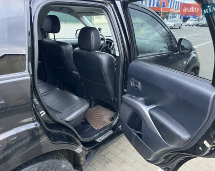 Черный Мицубиси Аутлендер, объемом двигателя 1.97 л и пробегом 244 тыс. км за 8700 $, фото 15 на Automoto.ua