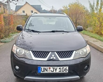 Черный Мицубиси Аутлендер, объемом двигателя 2 л и пробегом 226 тыс. км за 4700 $, фото 2 на Automoto.ua