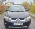 Черный Мицубиси Аутлендер, объемом двигателя 2 л и пробегом 226 тыс. км за 4700 $, фото 2 на Automoto.ua