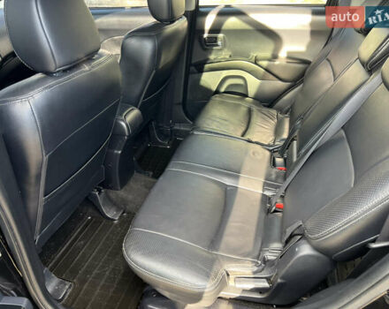 Чорний Міцубісі Аутлендер, об'ємом двигуна 2.4 л та пробігом 221 тис. км за 8900 $, фото 26 на Automoto.ua