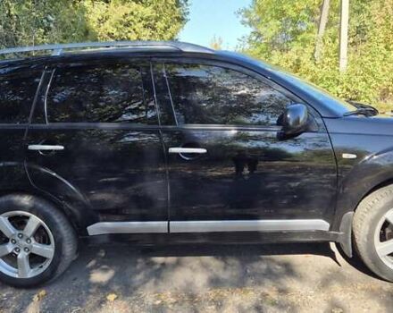 Черный Мицубиси Аутлендер, объемом двигателя 2.4 л и пробегом 178 тыс. км за 9150 $, фото 5 на Automoto.ua