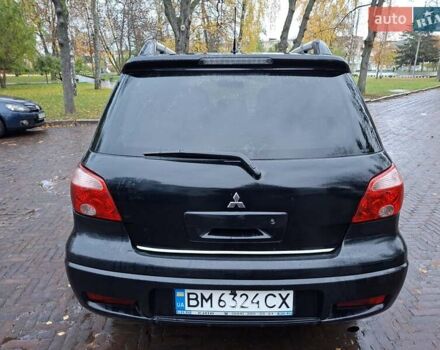 Чорний Міцубісі Аутлендер, об'ємом двигуна 2 л та пробігом 191 тис. км за 7100 $, фото 3 на Automoto.ua