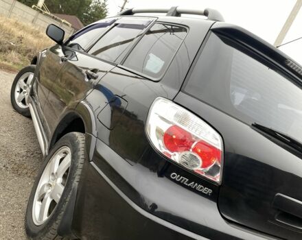 Черный Мицубиси Аутлендер, объемом двигателя 2.4 л и пробегом 178 тыс. км за 6900 $, фото 14 на Automoto.ua