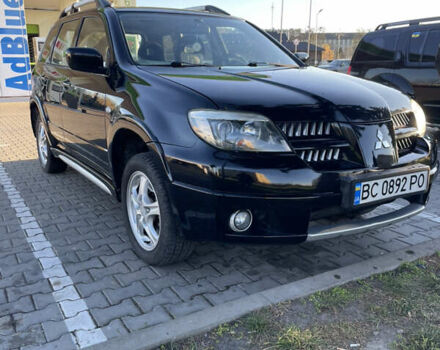 Чорний Міцубісі Аутлендер, об'ємом двигуна 2 л та пробігом 218 тис. км за 6300 $, фото 6 на Automoto.ua
