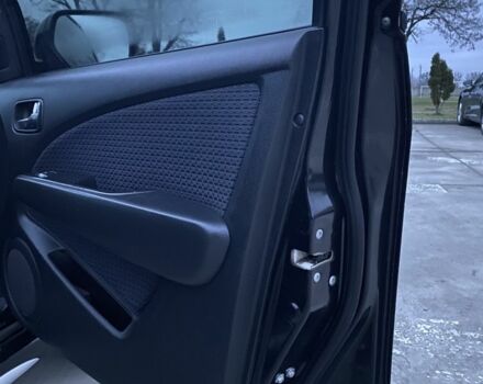 Чорний Міцубісі Аутлендер, об'ємом двигуна 2 л та пробігом 271 тис. км за 6799 $, фото 5 на Automoto.ua