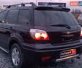 Чорний Міцубісі Аутлендер, об'ємом двигуна 2 л та пробігом 271 тис. км за 6940 $, фото 6 на Automoto.ua