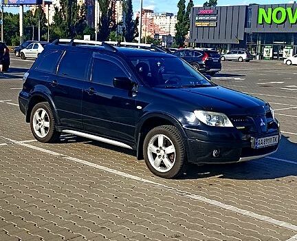 Чорний Міцубісі Аутлендер, об'ємом двигуна 2 л та пробігом 364 тис. км за 5900 $, фото 3 на Automoto.ua