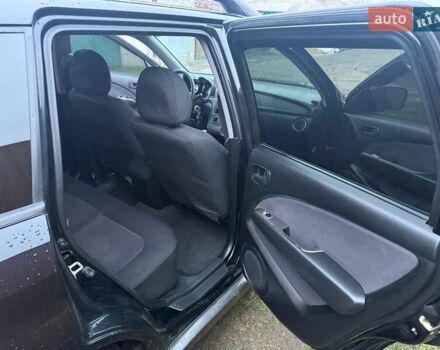 Черный Мицубиси Аутлендер, объемом двигателя 2 л и пробегом 232 тыс. км за 7000 $, фото 7 на Automoto.ua