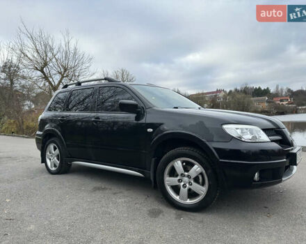 Чорний Міцубісі Аутлендер, об'ємом двигуна 2 л та пробігом 118 тис. км за 8100 $, фото 7 на Automoto.ua