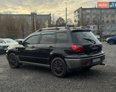 Черный Мицубиси Аутлендер, объемом двигателя 2 л и пробегом 240 тыс. км за 5500 $, фото 3 на Automoto.ua