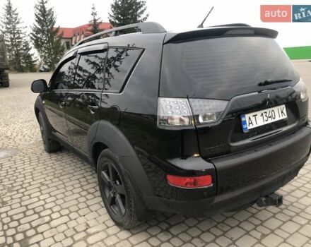 Чорний Міцубісі Аутлендер, об'ємом двигуна 2.4 л та пробігом 199 тис. км за 8999 $, фото 2 на Automoto.ua
