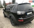 Чорний Міцубісі Аутлендер, об'ємом двигуна 2.4 л та пробігом 199 тис. км за 8999 $, фото 2 на Automoto.ua