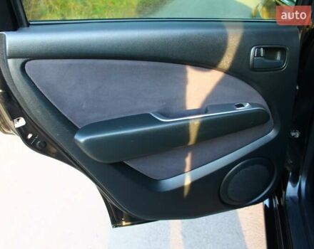 Черный Мицубиси Аутлендер, объемом двигателя 2 л и пробегом 189 тыс. км за 7200 $, фото 56 на Automoto.ua