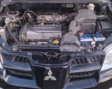 Міцубісі Аутлендер 2008 у Галиче на Automoto.ua Чорний Міцубісі Аутлендер, об'ємом двигуна 2 л та пробігом 112 тис. км за 7350 $, фото 16 на Automoto.ua