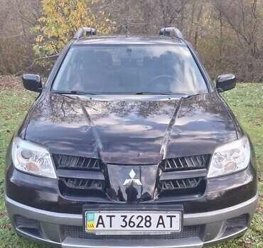 Міцубісі Аутлендер 2008 у Галиче на Automoto.ua Чорний Міцубісі Аутлендер, об'ємом двигуна 2 л та пробігом 112 тис. км за 7350 $, фото 1 на Automoto.ua
