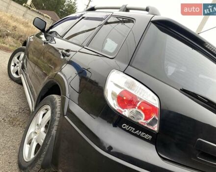 Черный Мицубиси Аутлендер, объемом двигателя 2.4 л и пробегом 178 тыс. км за 6900 $, фото 15 на Automoto.ua