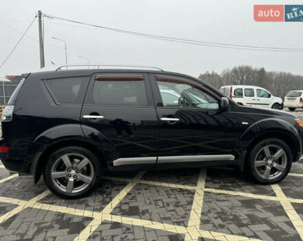 Черный Мицубиси Аутлендер, объемом двигателя 2.36 л и пробегом 120 тыс. км за 10100 $, фото 6 на Automoto.ua