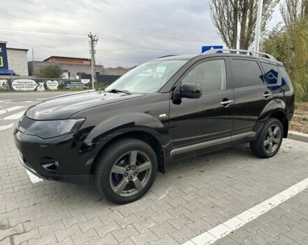 Чорний Міцубісі Аутлендер, об'ємом двигуна 2.4 л та пробігом 218 тис. км за 10000 $, фото 15 на Automoto.ua