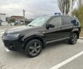 Чорний Міцубісі Аутлендер, об'ємом двигуна 2.4 л та пробігом 218 тис. км за 10000 $, фото 15 на Automoto.ua