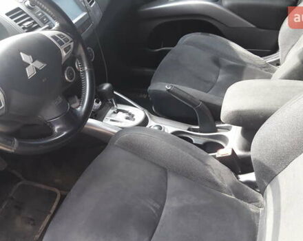Чорний Міцубісі Аутлендер, об'ємом двигуна 2.36 л та пробігом 277 тис. км за 8500 $, фото 4 на Automoto.ua