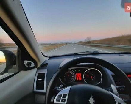 Черный Мицубиси Аутлендер, объемом двигателя 2.4 л и пробегом 228 тыс. км за 10400 $, фото 6 на Automoto.ua