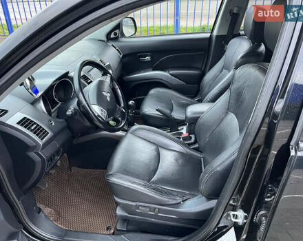 Черный Мицубиси Аутлендер, объемом двигателя 1.97 л и пробегом 244 тыс. км за 8700 $, фото 8 на Automoto.ua