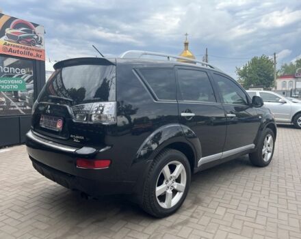 Черный Мицубиси Аутлендер, объемом двигателя 3 л и пробегом 235 тыс. км за 9800 $, фото 3 на Automoto.ua