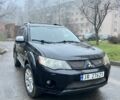 Чорний Міцубісі Аутлендер, об'ємом двигуна 2 л та пробігом 330 тис. км за 4900 $, фото 1 на Automoto.ua