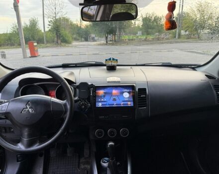 Черный Мицубиси Аутлендер, объемом двигателя 2.4 л и пробегом 369 тыс. км за 8500 $, фото 4 на Automoto.ua