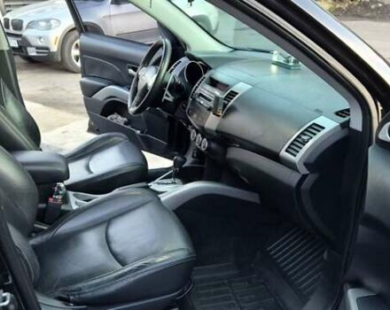 Чорний Міцубісі Аутлендер, об'ємом двигуна 2.4 л та пробігом 230 тис. км за 9700 $, фото 8 на Automoto.ua