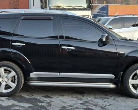 Чорний Міцубісі Аутлендер, об'ємом двигуна 2.4 л та пробігом 230 тис. км за 9700 $, фото 3 на Automoto.ua