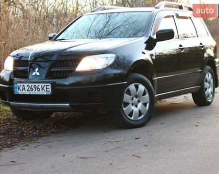 Черный Мицубиси Аутлендер, объемом двигателя 2 л и пробегом 189 тыс. км за 7200 $, фото 43 на Automoto.ua