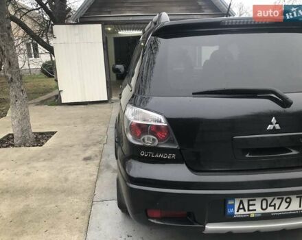 Чорний Міцубісі Аутлендер, об'ємом двигуна 2.38 л та пробігом 207 тис. км за 7000 $, фото 6 на Automoto.ua